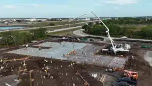 Aerial view of a Southwest Structural commercial building pad pour with pump truck