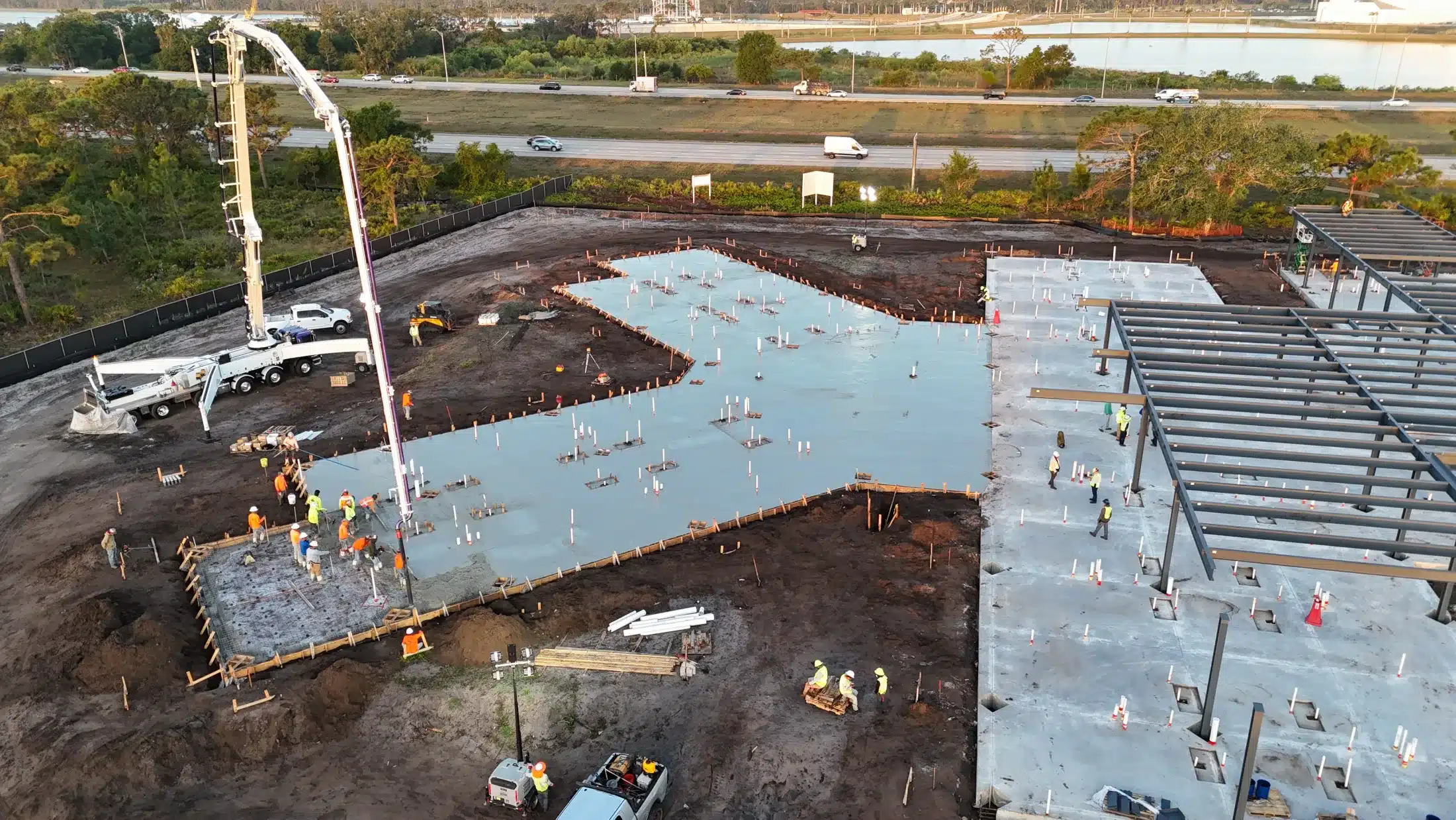 Aerial of a large commercial concrete pour and structural building pad in South Florida