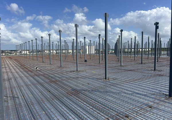 Elevated structural concrete deck on metal decking and steel columns